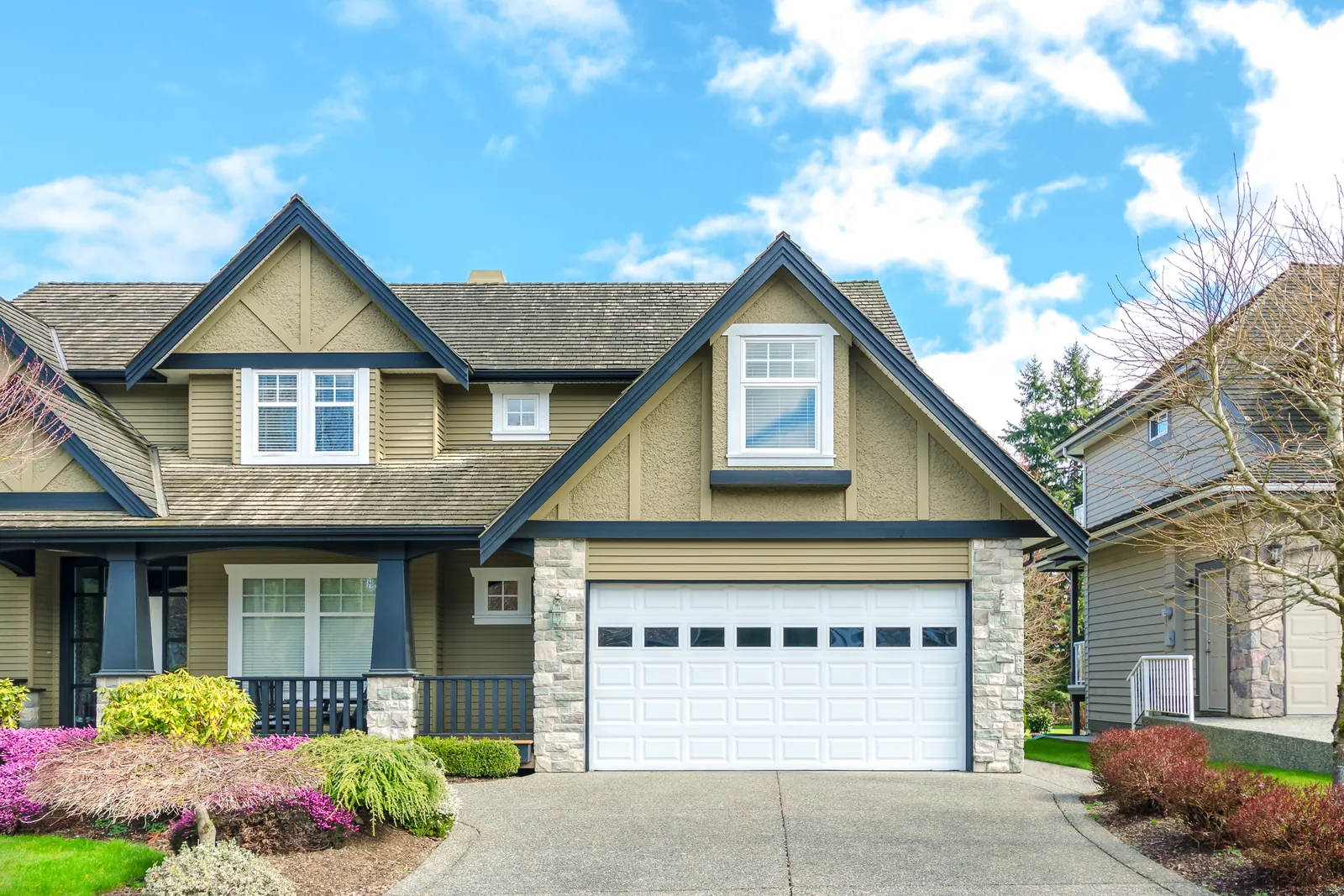 Charming home exterior with painted siding on a sunny day